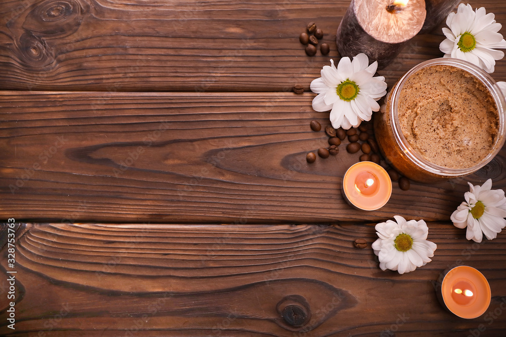 Fototapeta premium Coffee scrub on brown wooden background