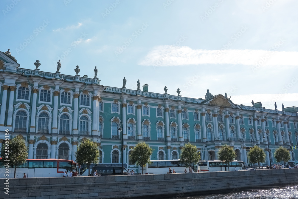 Famous landmark of Sankt Petersburg, Winter Palace which houses Hermitage museum.city view.Winter Palace, view from river, sky background.