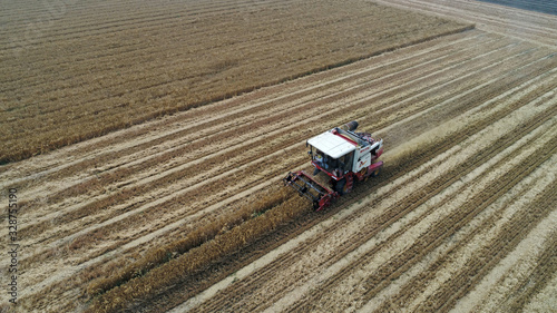 The harvester harvested wheat in the field, Luannan County, Hebei Province, China