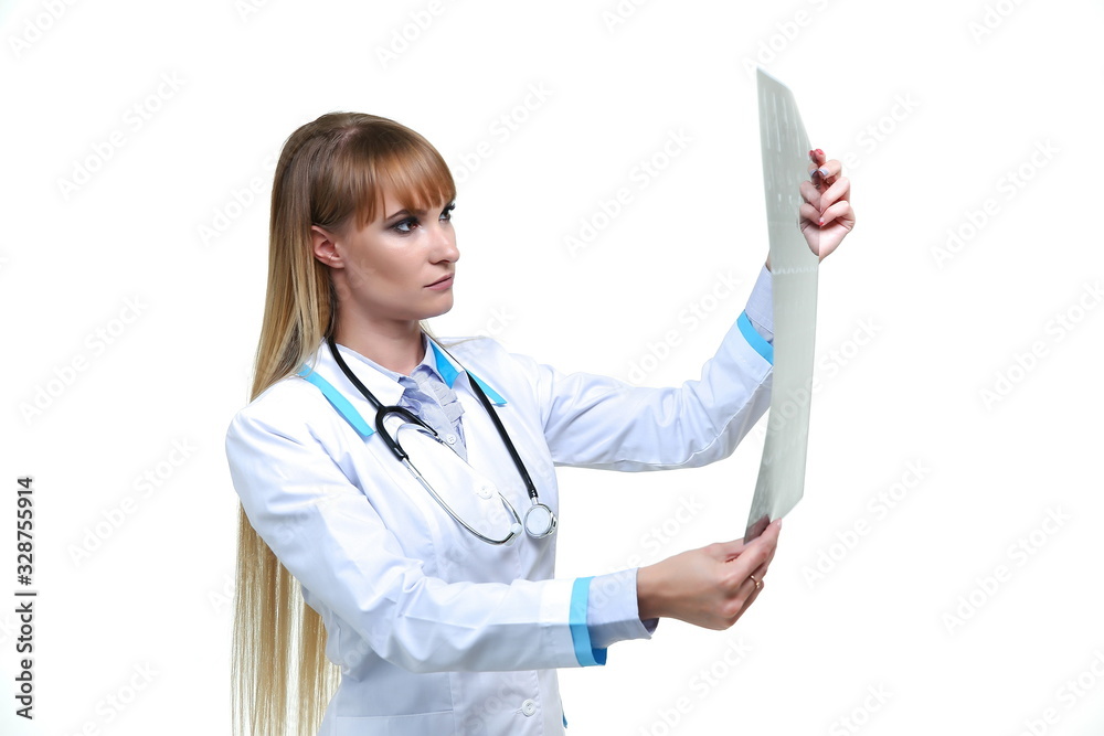 woman doctor looking through an x ray image isolated on white background woman doctor looking through an x ray image isolated on white background