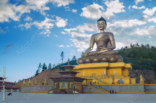 The golden statue of Lord Buddha at Buddha point in Thimphu, Bhutan photo