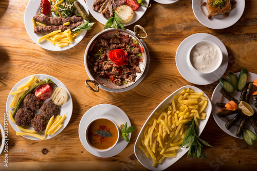 assorted turkish kebabs on wooden table