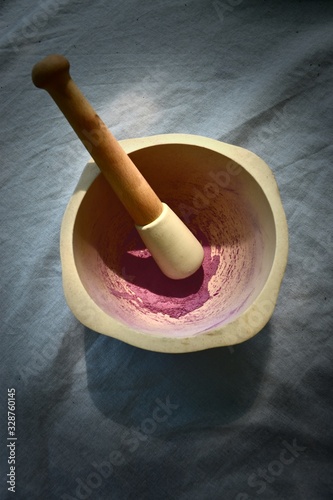 Little mortar with rose powder