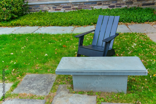 PRINCETON, NJ USA - NOVENBER 12, 2019: Landscaping, iron chairs on the green grass at Princeton University. New Jersey USA photo