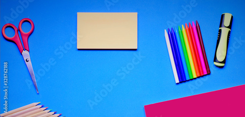 School supplies on blue background