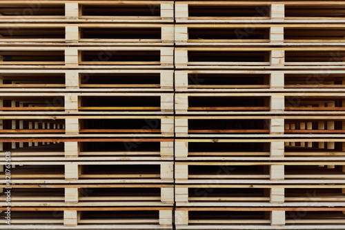 Close-up  texture and background of many wooden pallets stacked on top of each other