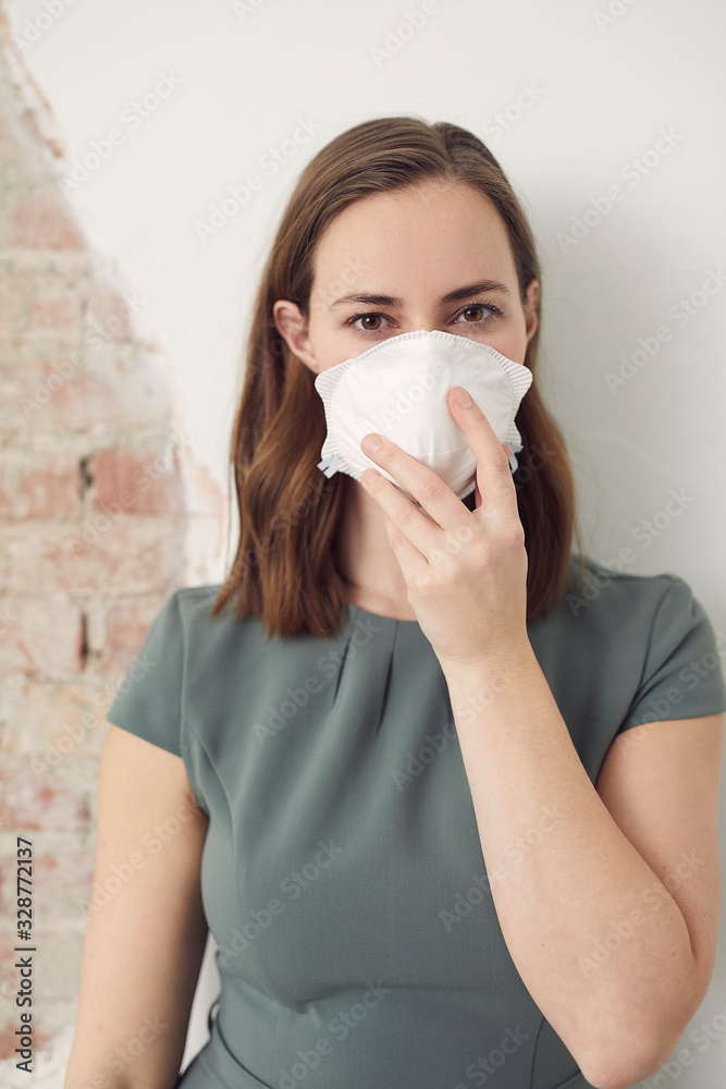 Woman wearing a mask to protect her from disease corona virus covid-19 Woman wearing a mask to protect her from disease corona virus covid-19