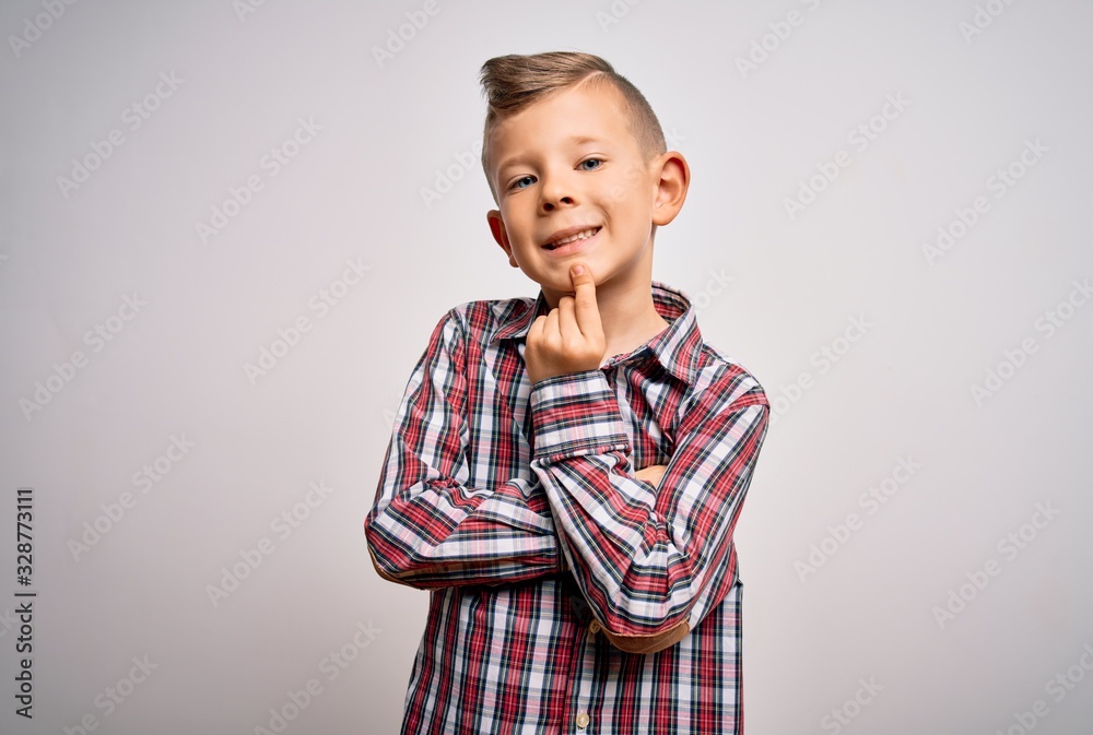 Young little caucasian kid with blue eyes wearing elegant shirt standing over isolated background looking confident at the camera smiling with crossed arms and hand raised on chin. Thinking positive. Young little caucasian kid with blue eyes wearing elegant shirt standing over isolated background looking confident at the camera smiling with crossed arms and hand raised on chin. Thinking positive.