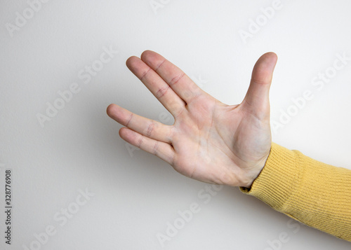 Hand performing Captain Spock's Vulcan salute photo