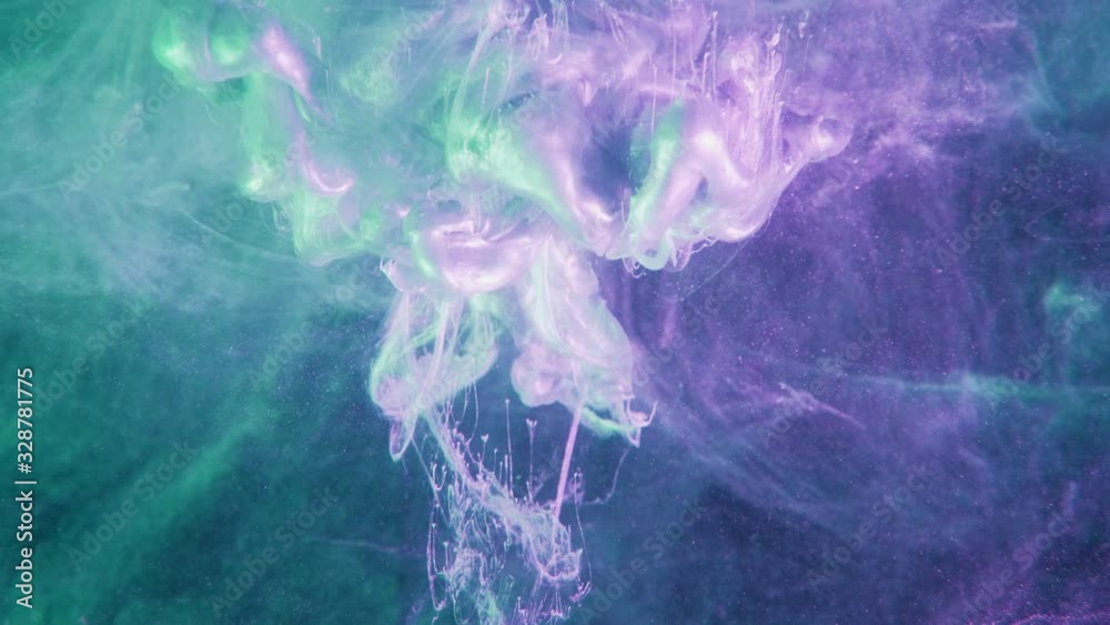 Color fluid explosion. Atomic cloud. Pearl paint splash in purple aqua menthe green neon light.
