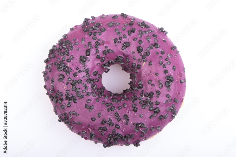 purple chocolate donut with chocolate crumbles, isolated purple chocolate donut with chocolate crumbles, isolated