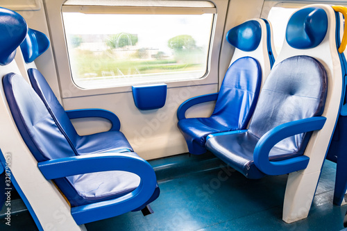 Fototapeta Naklejka Na Ścianę i Meble -  Rome, Italy. Inside public transportation travel, train with empty seats. No people traveling. City state lock down ghost town. Covid19/ covid-19/ Coronavirus/ Corona Virus outbreak epidemic pandemic.