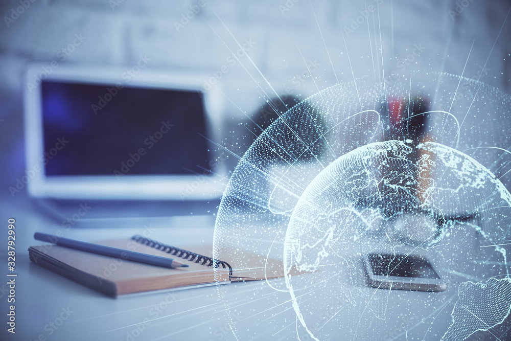 Computer on desktop with social network hologram. Multi exposure. Concept of international people connections. Computer on desktop with social network hologram. Multi exposure. Concept of international people connections.