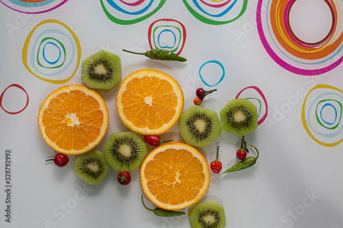 lemon kiwi and cookies on table