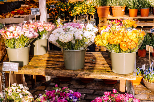 Bouquets of various ranunculus on flower street market
