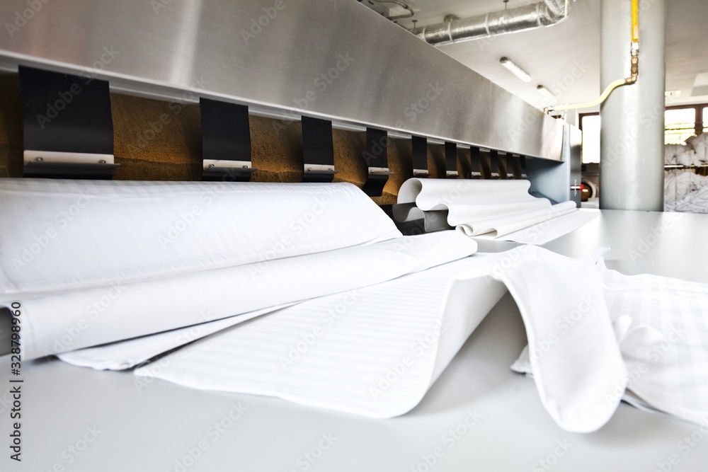 Mangle At Big Industrial Laundry Washing Machines Clean White Sterile mangle-at-big-industrial-laundry-washing-machines-clean-white-sterile