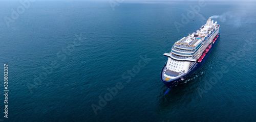 Aerial view of beautiful white and black cruise ship above luxury cruise in the ocean sea  concept tourism travel on holiday take a vacation time on summer, webinar banner © Yellow Boat