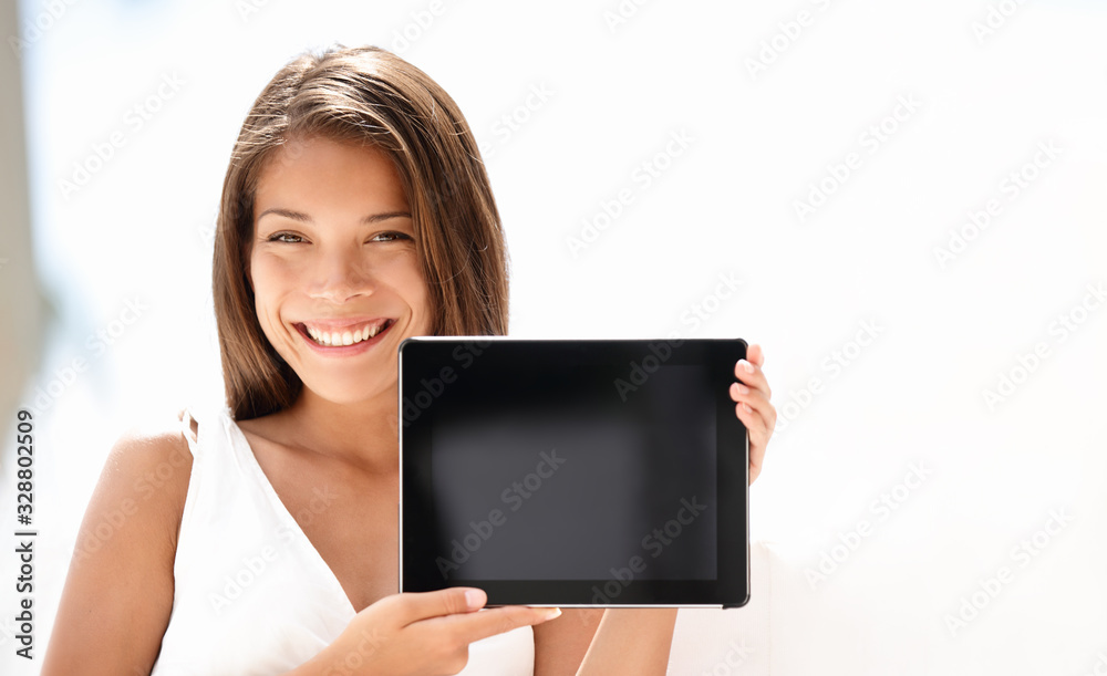 Tablet computer young Asian woman smiling happy using pc screen for business office work holding showing black screen. Tablet computer young Asian woman smiling happy using pc screen for business office work holding showing black screen.