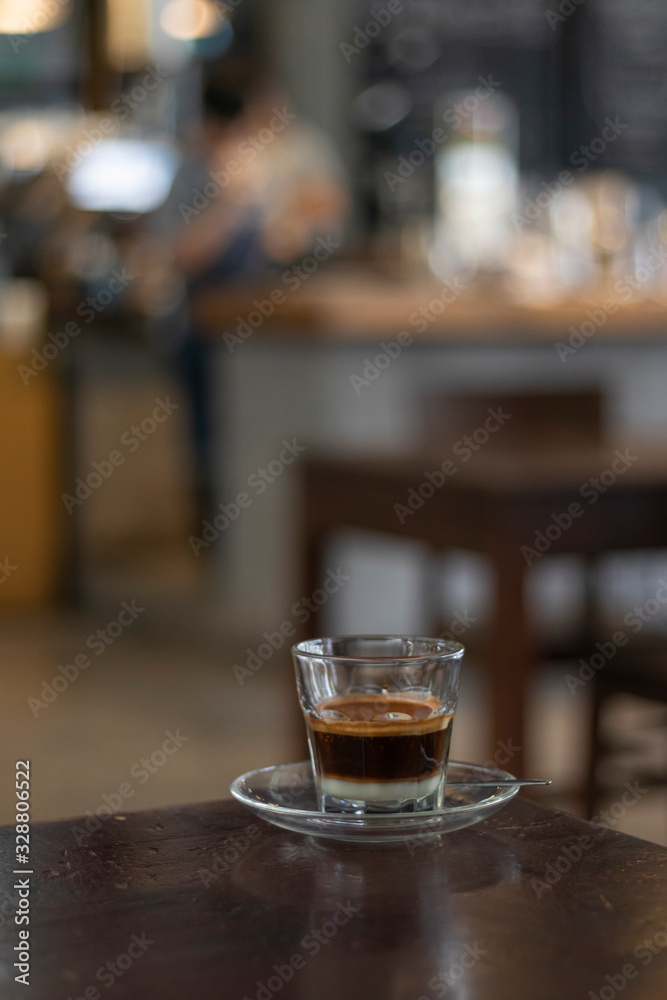 vietnamese coffee on wooden table ( selected focus)