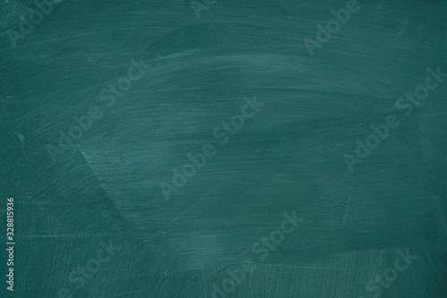 Abstract texture of chalk rubbed out on blackboard or chalkboard , concept for education, banner, startup, teaching , etc.