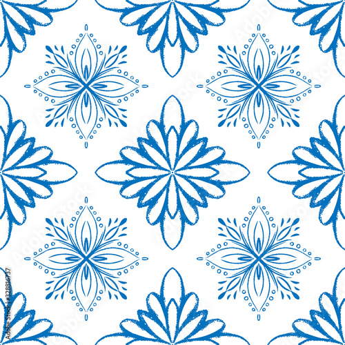 Blue tile seamless pattern design. Doodle snow or mandala illustration.