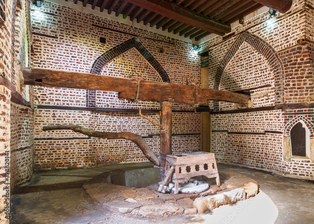 Ancient rotary Flour Mill used to be rotated by animal power, known as Abu  Shaheen Mill