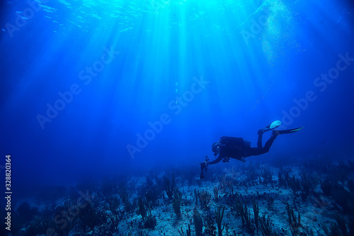diver underwater unusual view, concept depth, diving in the sea © kichigin19