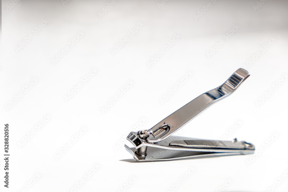 Close-up old Nail clippers isolated on white background Close-up old Nail clippers isolated on white background