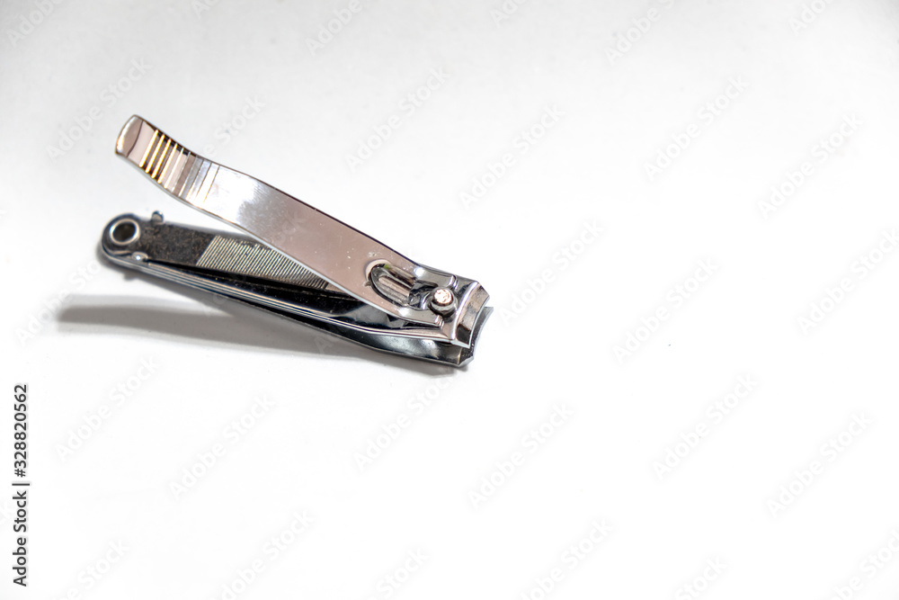 Close-up old Nail clippers isolated on white background Close-up old Nail clippers isolated on white background