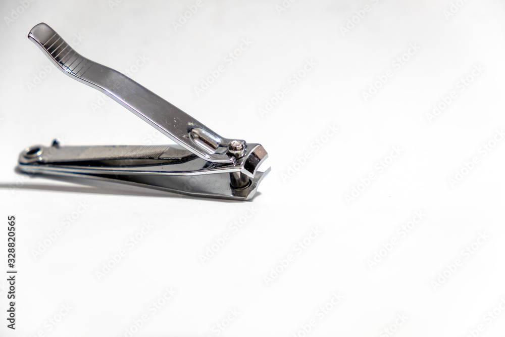 Close-up old Nail clippers isolated on white background Close-up old Nail clippers isolated on white background