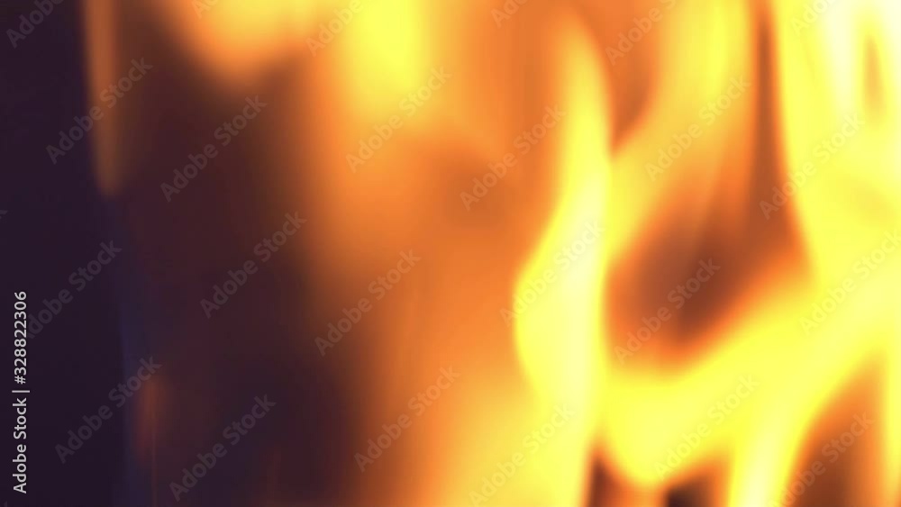 Fire in slow motion isoélated on black, gray. Fire Igniting And Burning - Slow Motion. flames ignite on a black background. Real fire.