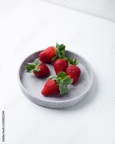 Summer healthy fruit composition with red strawberries