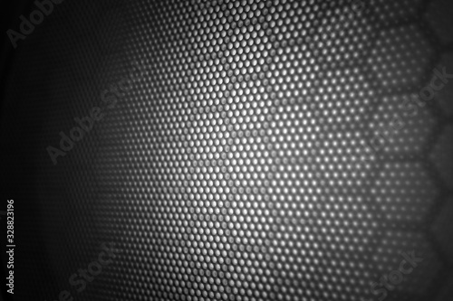 Hexagon pattern black gradients light texture background.