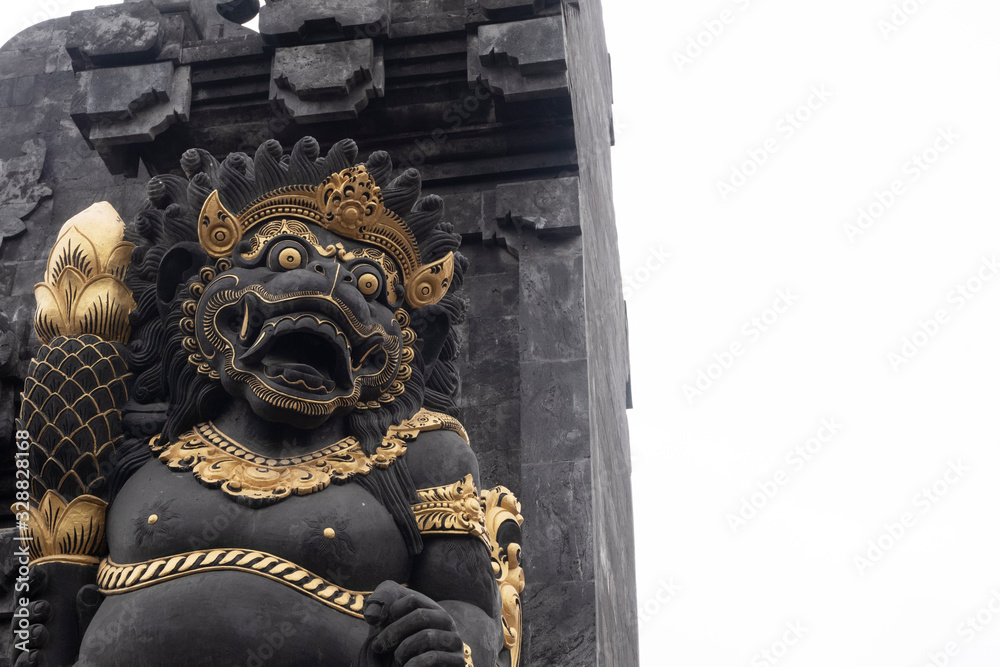 Stone carved demons protecting the staircase entrance of Pura Kehen hindu temple in Bali, Indonesia.