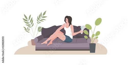woman epilating legs girl sitting on sofa using modern laser epilator hair removal skin care concept horizontal full length vector illustration