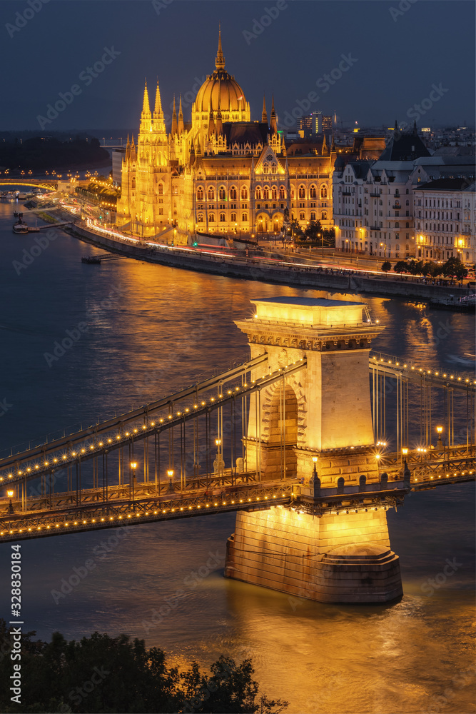 Chain bridge and the Parliament building at night in Budapest