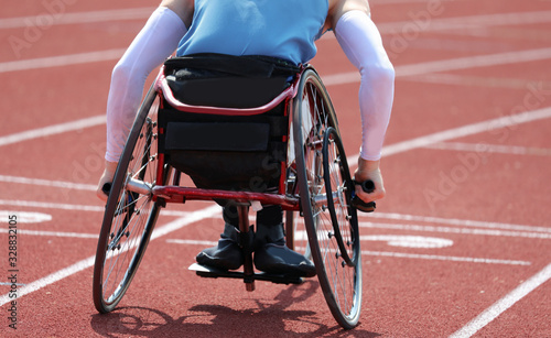 Obraz na plátně Paralympic athlete in a wheelchair with a paralysis in the legs