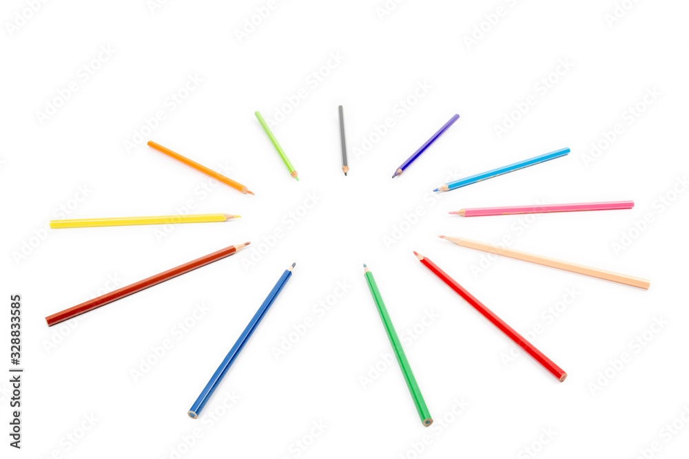 round radius and circle arrangement by blunt colour pencils directed and pointed to the center of the wheel. It has copy space on the white background for any text insertion.