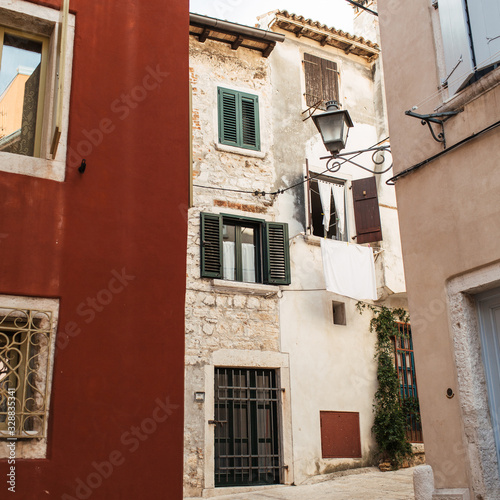 2019, Europe, Croatia, Rovinj. Architecture of old town, colorful buildings with old wood shutters. Travel, adventure concept. City background.