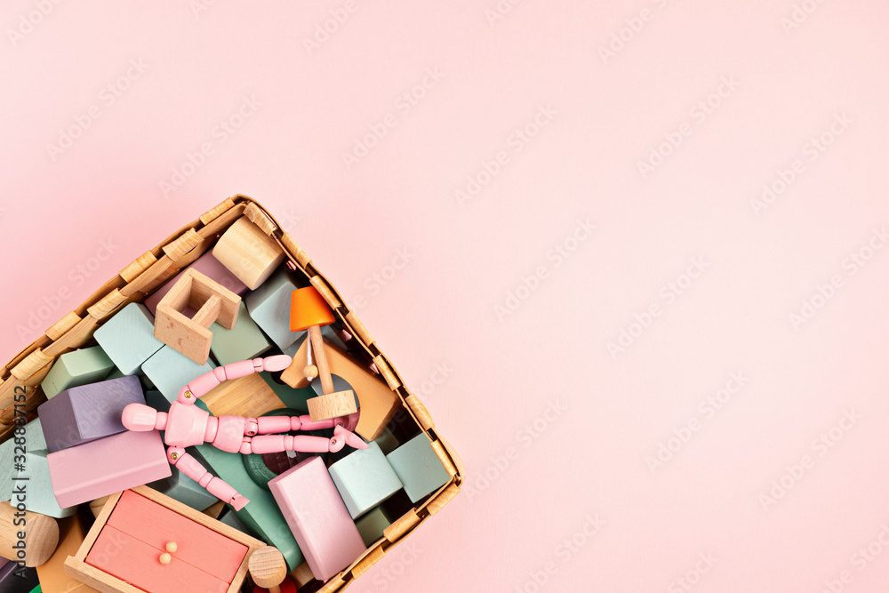 Flat lay with wooden blocks in pastel colors. Eco friendly, zero waste, plastic free, educational, gender neutral toys for children Flat lay with wooden blocks in pastel colors. Eco friendly, zero waste, plastic free, educational, gender neutral toys for children