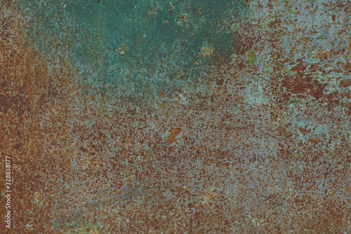 colored metal texture from old dirty green iron wall in brown rust