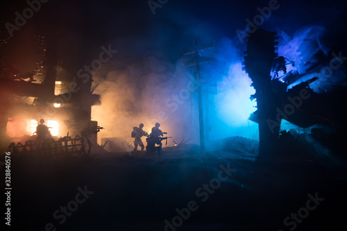 War Concept. Military silhouettes fighting scene on war fog sky background, World War Soldiers Silhouette Below Cloudy Skyline At night.