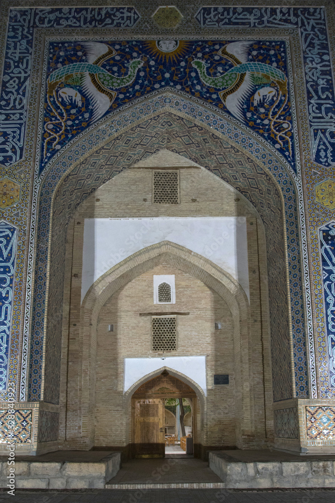 Nadir Divan-Begi Madrasah, one of the most popular touristic attraction in the city. Bukhara, Uzbekistan, Central Asia.