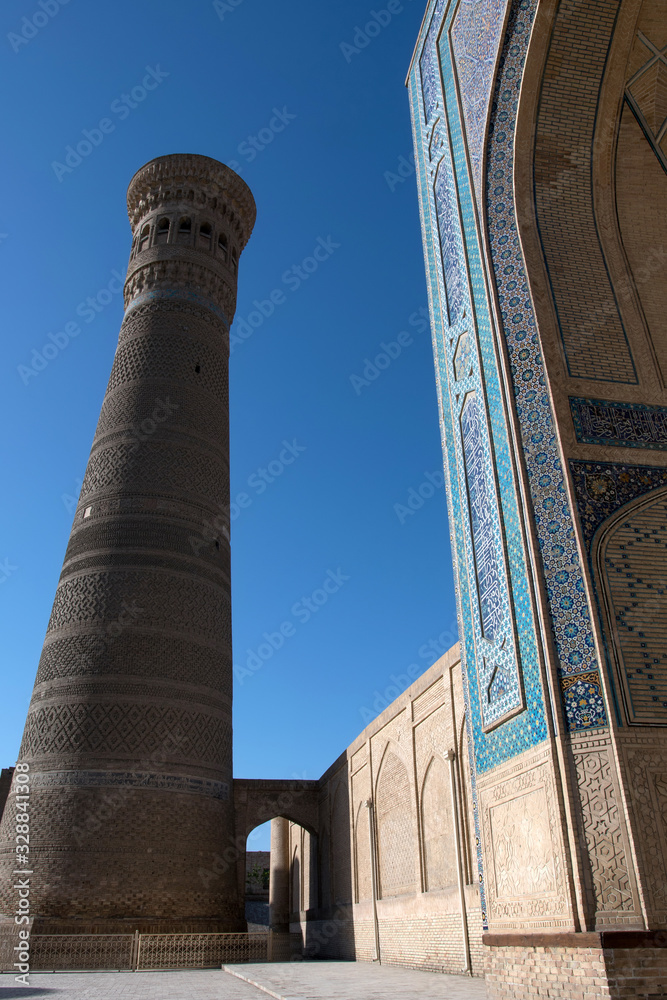 Great Minaret of the Kalon and Kalon (Kallan) Mosque portal. Bukhara, Uzbekistan, Central Asia.