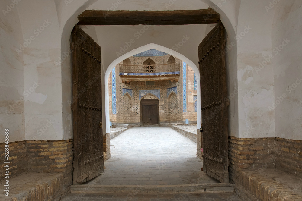 Gate of Mohammed Rakhim Khan Madrasah. Khiva, Uzbekistan, Central Asia.