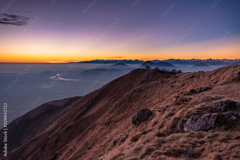 Winter sunset from an alpine peak of Friuli-Venezia Giulia