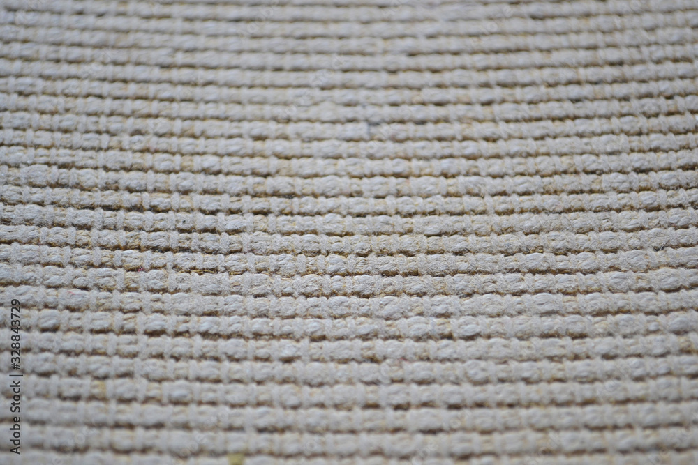 The wrong side of an old carpet, background The wrong side of an old carpet, background
