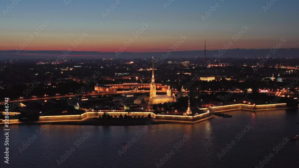 Aerial around view of Peter and Paul Fortress with cityscape after sunset, Saint-Petersburg, Russia, 4k Aerial around view of Peter and Paul Fortress with cityscape after sunset, Saint-Petersburg, Russia, 4k