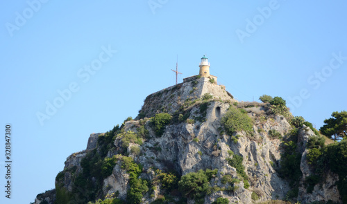 Lighthouse of Old Fortress in Kerkyra, the Corfu Town in Greece.