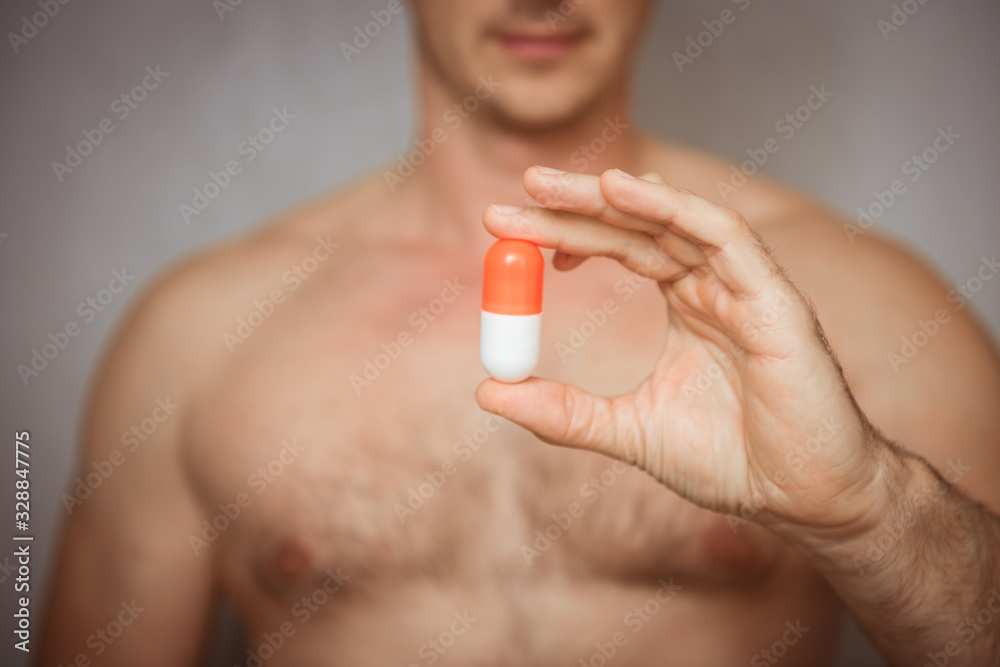 Athlete bodybuilder takes dope in the form of tablets form of pharma rapid progress in muscle development Athlete bodybuilder takes dope in the form of tablets form of pharma rapid progress in muscle development